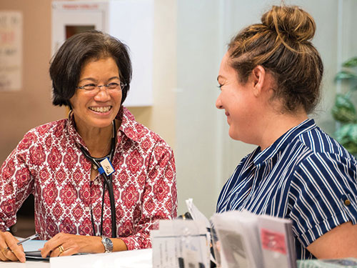 Margaret Dunn, a physician with the Bread of Healing Clinic, and a  clinic volunteer.