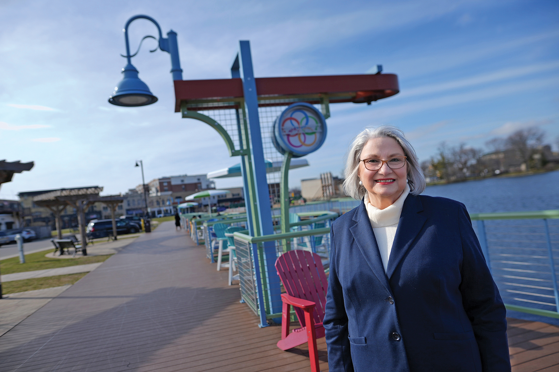 Maribeth Bush, former coordinator of the Oconomowoc Area Foundation, at her favorite place, the downtown boardwalk along Fowler Lake in Oconomowoc.