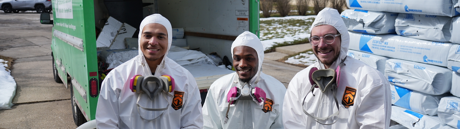 Three men dressed in hazmat suits to remove led from city of Milwaukee homes.